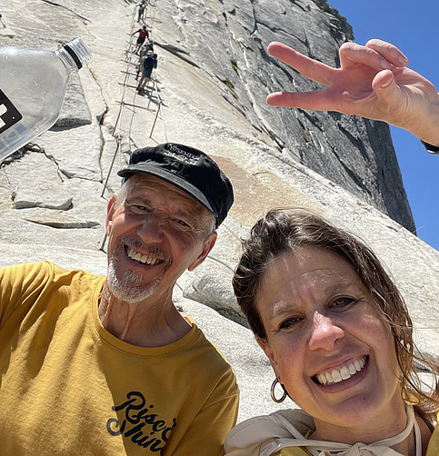 <img alt="Al Perry and Erin East at the cables of Half Dome">