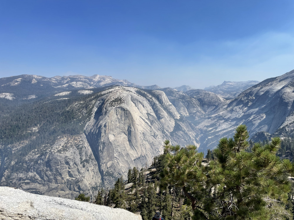 <img alt="The view from the sub-dome of Half Dome in Yosemite National Park,">
