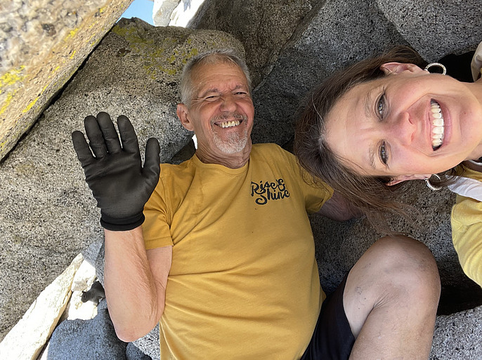 <img alt="Al Perry and Erin East in a cave at the top of Half Dome">