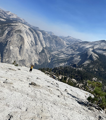 <img alt="Al Perry ascending the sub dome of Half Dome in Yosemite National Park.">