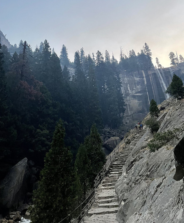 <img alt="the seemingly endless assent of granite steps to the top of Venal Falls in Yosemite">