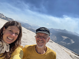 <img alt="Erin East and Al Perry on the top of Half Dome in Yosemite National Park">