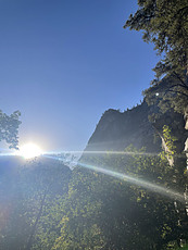 <img alt="Sun setting along the mist trail in Yosemite">