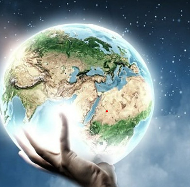 Alt='Globe of Earth held by a hand'